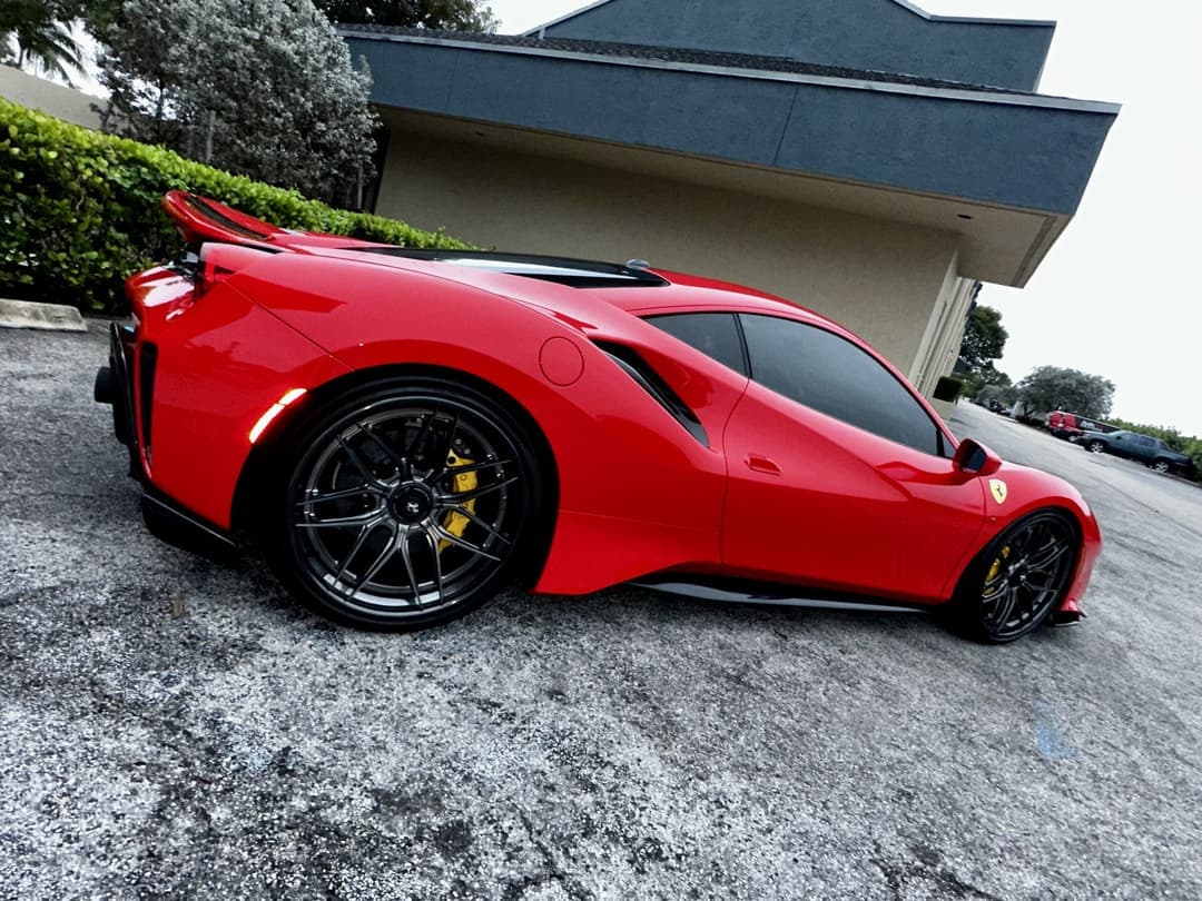Glossy red Ferrari 488 Pista after ceramic coating