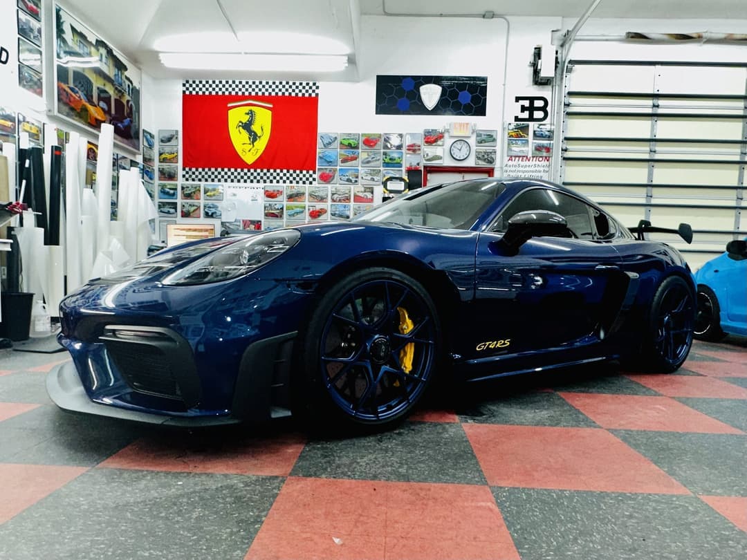 Porsche Cayman GT4 RS in the Auto SuperShield bay for a Parkland customer
