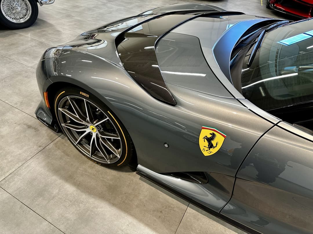 Close-up of XPEL film edge on a Ferrari front end